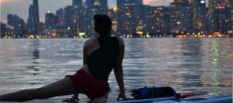 SUP Yoga with the Toronto skyline